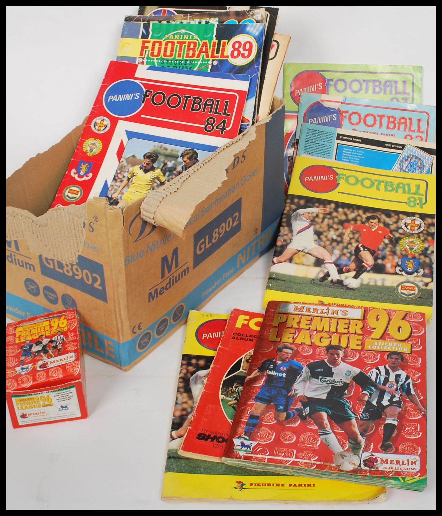 A large collection of vintage Panini and Merlin football premier league sticker albums to include