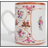 A late 17th / early 18th century circa 1800 Chinese porcelain tankard with famille rose decoration