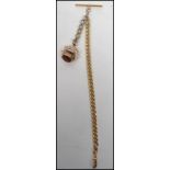 A 9ct gold chain and bar of flat belcher kerb link form, lobster clasp with swivel 375 / 9ct