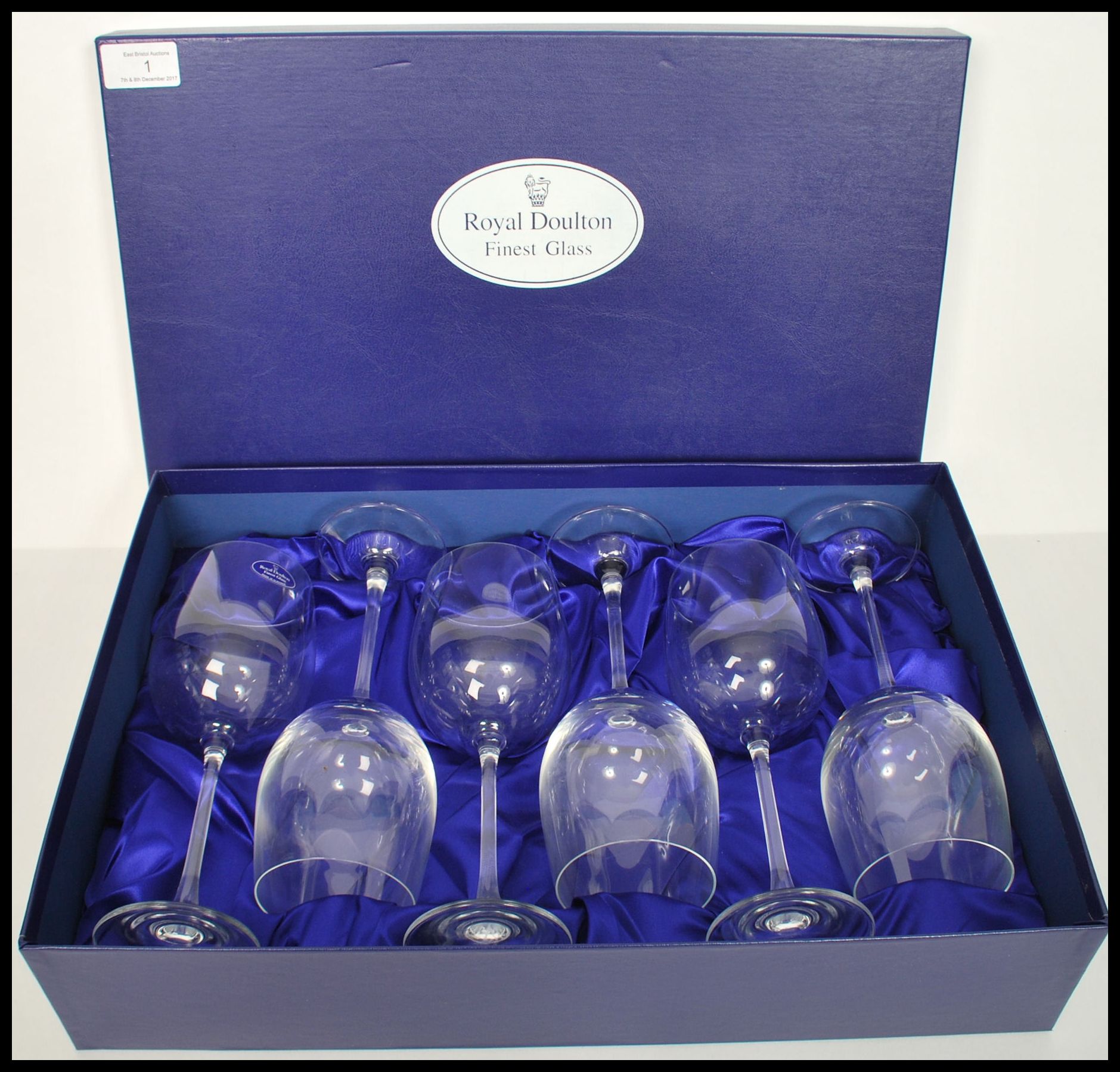 A boxed set of six unused Royal Doulton Finest Glass wine glasses contained within the original