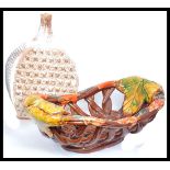 A retro 20th century studio pottery lattice work fat lava style fruit bowl together with a studio