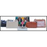 A collection of five ladies handbags / evening bags to include an Ostrich skin bag, a multi coloured