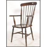 A Victorian beech and elm wood windsor chair / arm