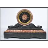 A 19th century French rouge marble barrel clock by Jean-Baptiste Delettrez. The 8 day movement