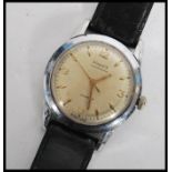 A vintage mid 20th century Phenix Chronostop 17 jewel Swiss made wrist watch having a silvered