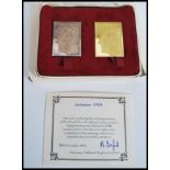 A Royal Silver Wedding Anniversary silver and gold commemorative stamp replica set containing one