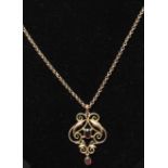 A 19th century Victorian 9ct gold garnet stone pendant set to a 9ct gold belcher link chain. The