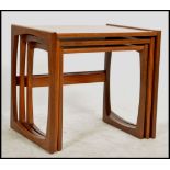 A G-Plan retro teak wood 1970's graduating nest of tables in the Quadrille pattern. The tables