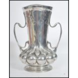 A 19th century Art Nouveau Orivit pewter twin handled baluster vase, serial number 2162. Stamped