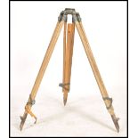 A vintage mid  20th century wooden surveyors Field Easel tripod retaining the original leather