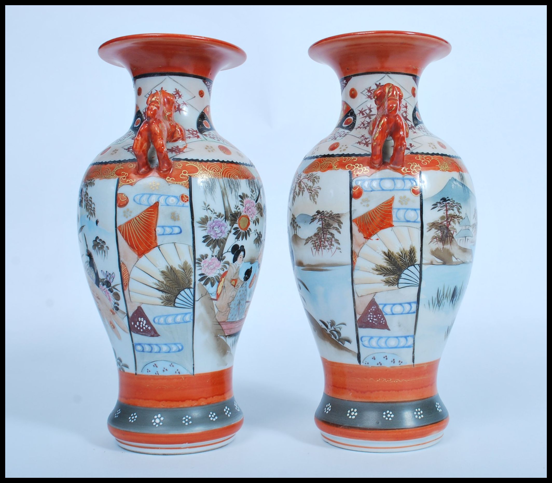 A pair of Japanese Kutani vases, Meiji, with twin handles modelled as dogs of fo, the panels - Image 2 of 6