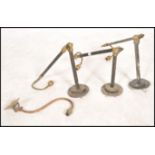 A set of 3 antique style 20th century wall mounted anglepoise lamps. Each with twin arms having