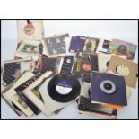 A collection of vintage vinyl record 45rpm 7" singles dating from the 1960s to include an Elvis