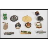 A group of vintage 20th century pin badges to include Home Guard, WW1 sweet heart brooch, enamel