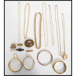 A good group of vintage jewellery to include a 9ct gold metal core bangle, yellow metal necklaces