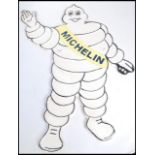 A  vintage style cast metal point of sale advertising garage wall plaque for Michelin / Monsieur