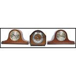 A group of vintage 20th century wooden cased mantle clocks to include two Napoleon hat clocks