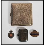 A silver hallmarked vesta match case and strike along with a unmarked silver cheroot case, a