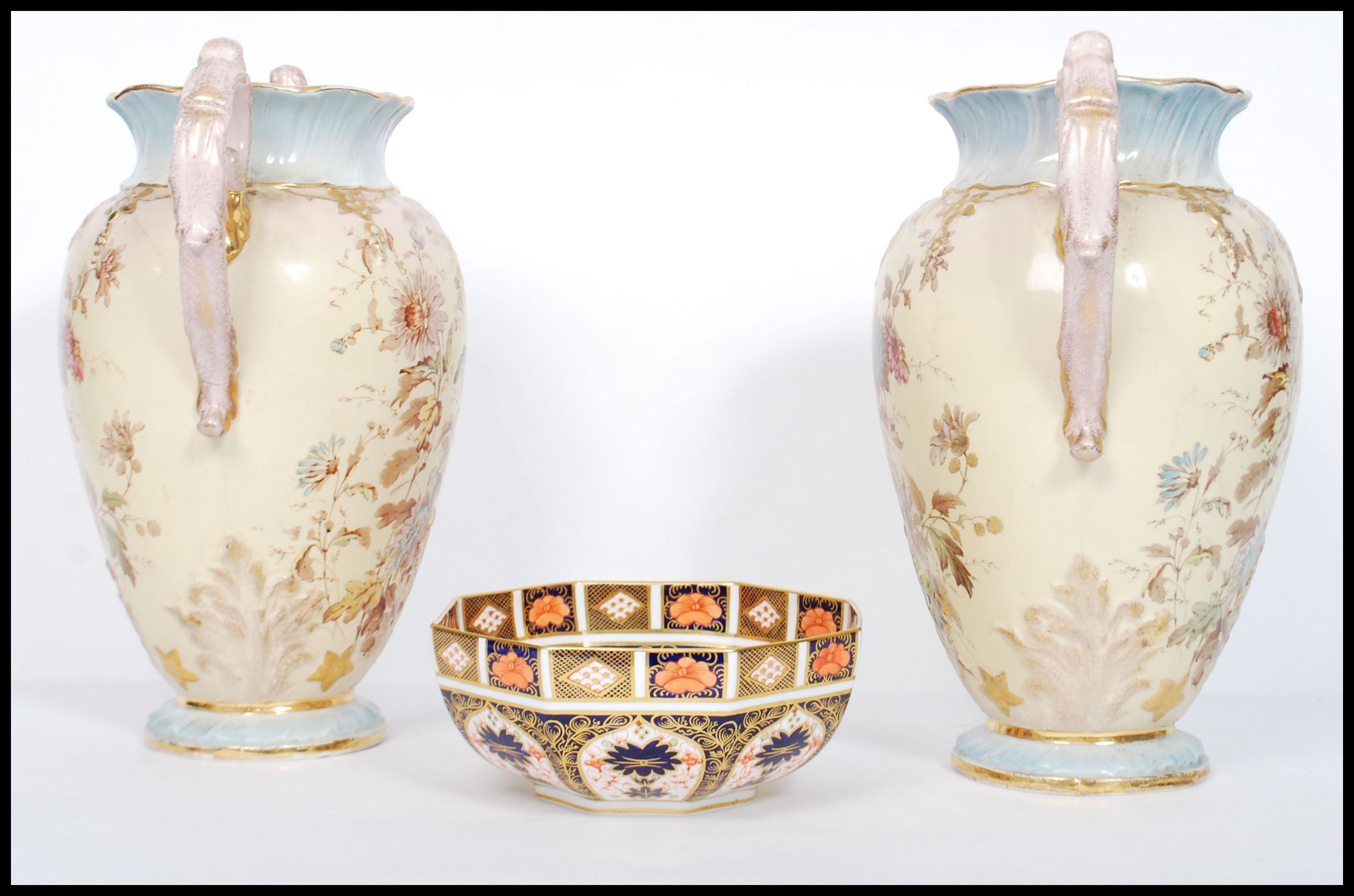 A large pair of Victorian Stafforshire twin handles vases having ivory blush grounds with floral - Image 4 of 7