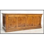 A good 20th century Jacobean revival large solid golden oak coffer chest. Of large rectangular
