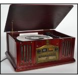 A retro style 20th century wooden cased hi-fi system having record deck, radio and Cd player etc