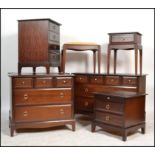 A collection of Stag ' minstrel ' pattern mahogany bedroom furniture to include a pair of chest of