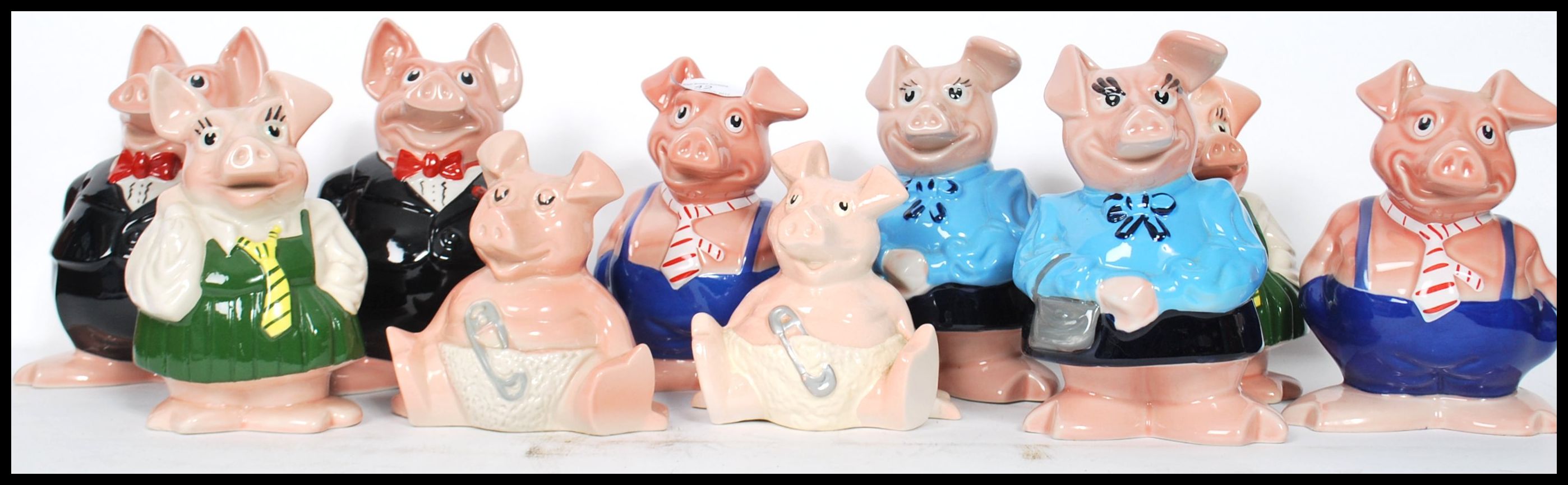 NatWest Piggy Banks; Two sets ( x10 in total ) original vintage Wade advertising NatWest Bank