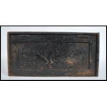 A 19th century heavy cast iron strong box, panelled sides, brass drop swag carry handles to ends,