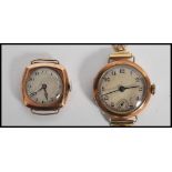 Two vintage 20th century hallmarked 9ct gold watches one set to a rolled fold strap having a