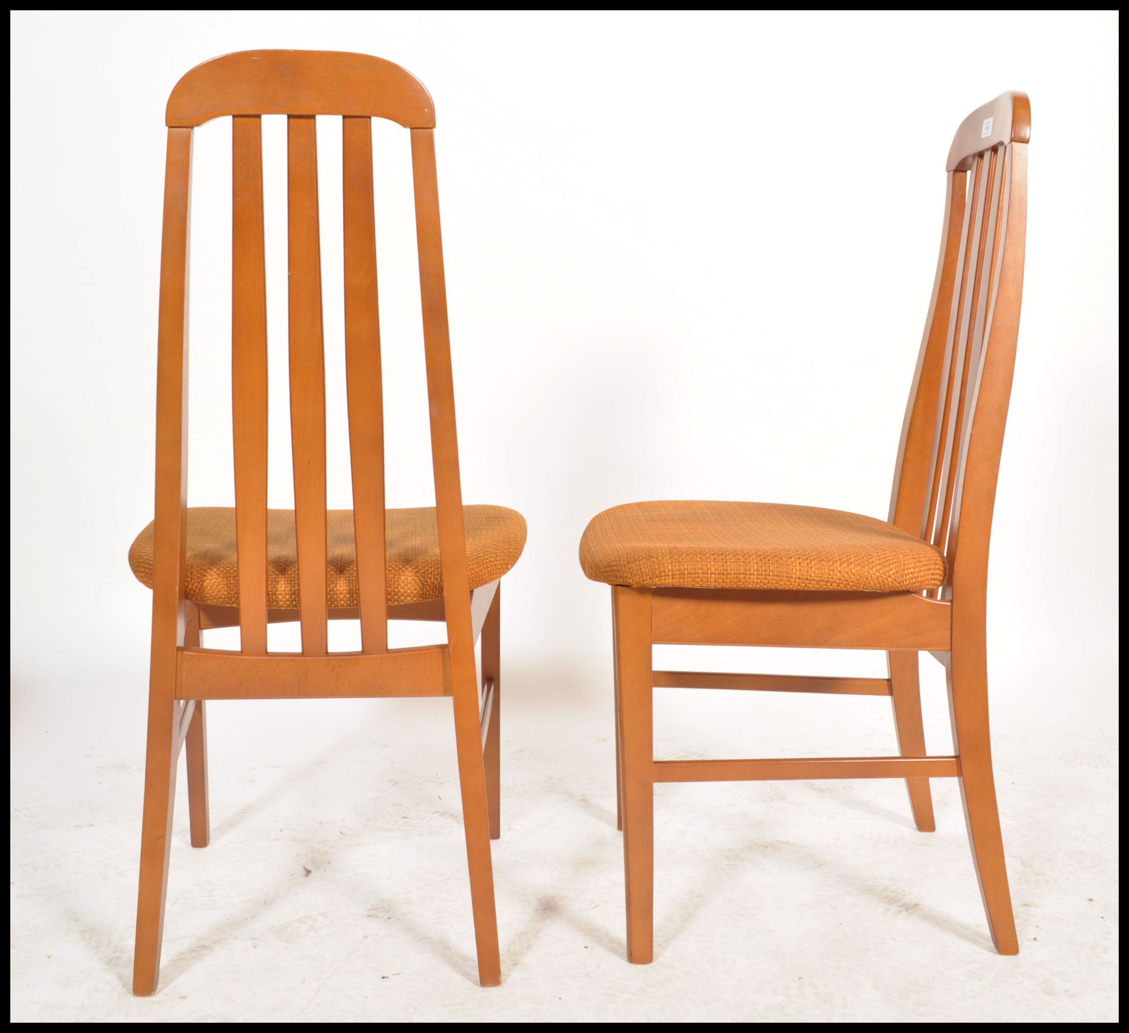 A set of 4 20th century Nathan furniture dining chairs in teak being raised on tapering legs with - Image 4 of 4