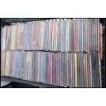 A large collection of CD singles and CD albums featuring various artists and genres to include