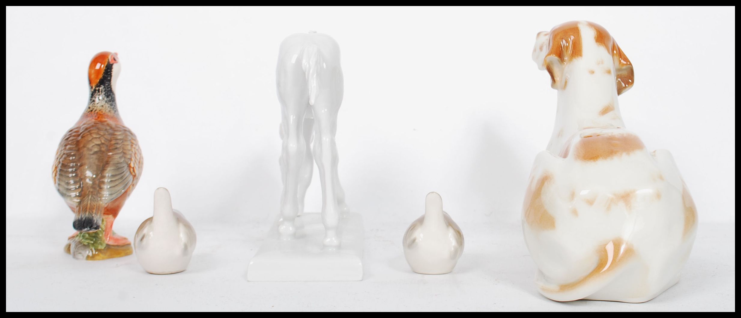 A collection of ceramic figurines to include a pair of Lomonosov / USSR Wrens, a large hound and a - Image 3 of 9