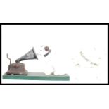 A vintage style cast iron point of sale advertising figurine of Nipper the HMV gramophone dog having