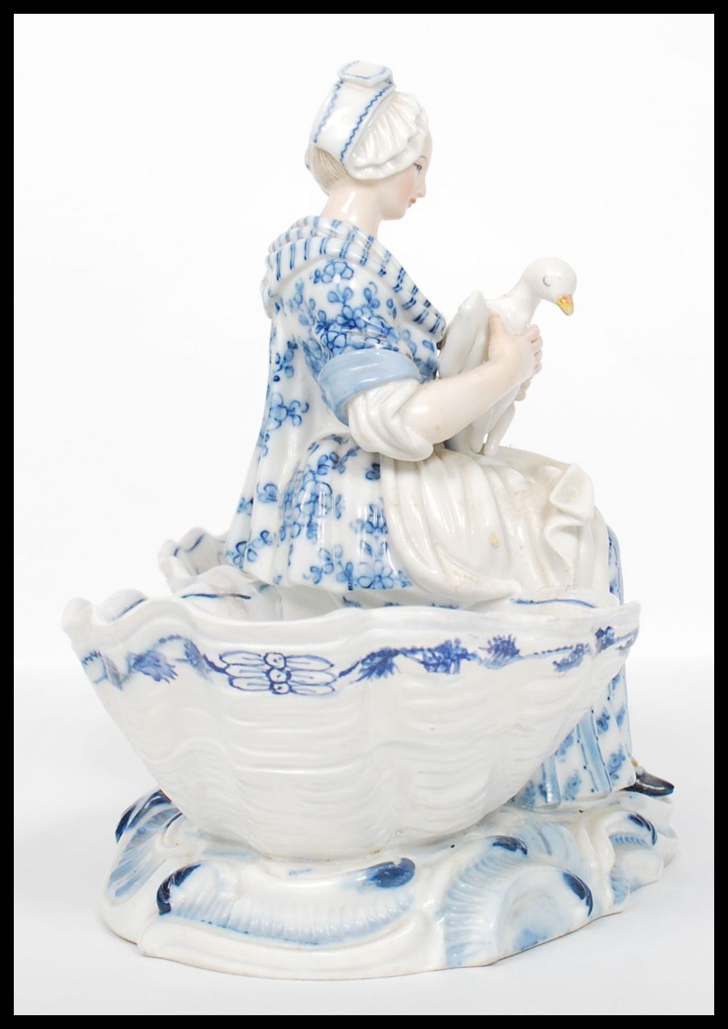 A 19th century Meissen figural table salt modelled as a young girl holding a goose seated between - Image 4 of 6