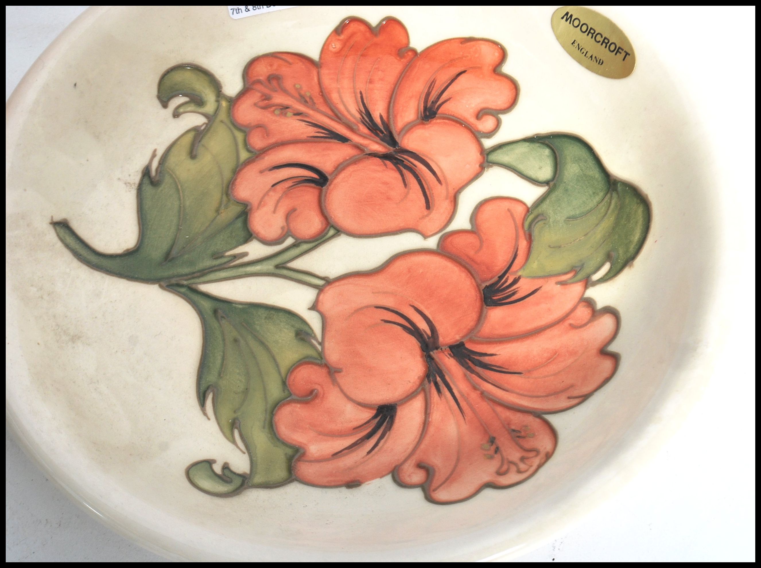 A Moorcroft signed modern tube lined cabinet Plate / bowl in the ' Coral Hibiscus ' design on - Image 5 of 7