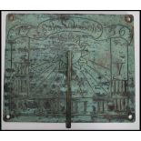 Sundial, a 19th Century ? circular bronze sundial engraved with sun motif and roman numerals  and