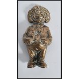 A 19th century Victorian bronze hollow figurine of a clown with open mouth.