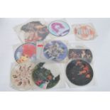 A group of vintage vinyl record picture discs to include The Members, Ashes and Stars, Juluka,