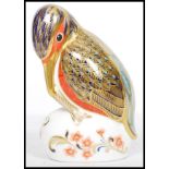 A Royal Crown Derby paperweight, Kingfisher gold stopper, red stamp to base dated mark LV for