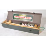 A vintage retro 20th century Jacques Croquet Set in the original box complete with the contents to