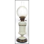 A 19th century brass and glass oil lamp having col