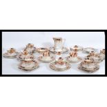 A Victorian Imari pattern extensive six person tea set consisting of six cups saucers and side