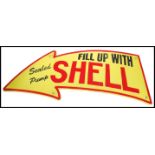 A vintage style painted cast iron advertising point of sale garage sign for Shell with notation