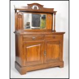 A 19th century walnut Arts & Crafts mirror back sideboard dresser. Raised on plinth base with