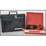 A retro 20th century Fidelity red colourway portable record player  together with a Three In One