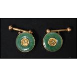 A pair of vintage Chinese 18ct gold and jade cuffs / cuff links of roundel form having ball ended