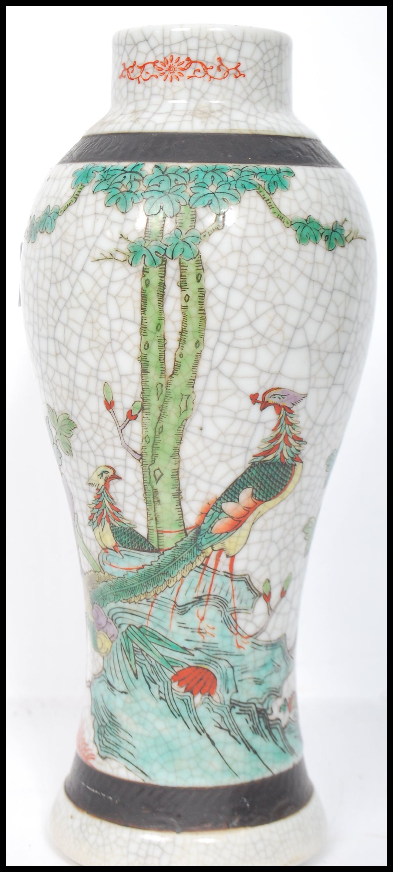 A 19th century crackle glaze Chinese Oriental vase depicting birds of paradise. The vase of