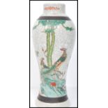 A 19th century crackle glaze Chinese Oriental vase depicting birds of paradise. The vase of