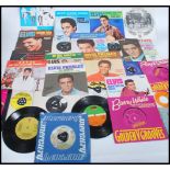 Vinyl Records - A collection of 45rpm vinyl 7" singles featuring various artists to include Black