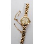 A 20th century  ladies 9ct gold cased bracelet watch by Rotary, having quartz movement set to a